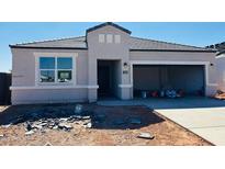 Charming single-story home with a gray exterior, tile roof, and spacious two-car garage at 28200 N Nealite Dr, San Tan Valley, AZ 85143