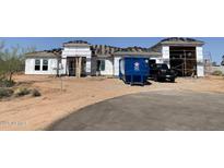 New construction home featuring an in-progress tile roof and modern design, offering a glimpse into future living at 28282 N 158Th St, Scottsdale, AZ 85262