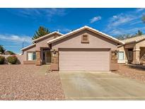 Charming single-story home with a two-car garage and low-maintenance desert landscaping at 7808 W Palo Verde Dr, Glendale, AZ 85303