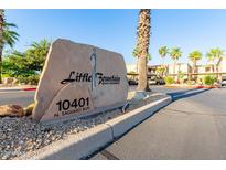 Community sign displaying 'Little Fountain Resort Condominiums' and the address at 10401 N Saguaro Blvd # 104, Fountain Hills, AZ 85268
