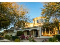 Charming home with desert landscaping, a circular turret, and a welcoming entryway at 22339 N 77Th Way, Scottsdale, AZ 85255