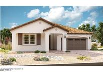 Charming single-story home with a tile roof, two-car garage, and desert landscaping at 21920 E Saddle E Ct, Queen Creek, AZ 85142