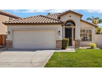 Charming single-Gathering home featuring a two-car garage and well-maintained lawn at 3431 S Felix Way, Chandler, AZ 85248
