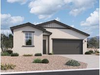 Charming single-story home with a well-manicured front yard, neutral stucco, and a two-car garage at 47747 W Kenner Dr, Maricopa, AZ 85139