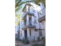 Stylish multi-story condo with private balconies and modern architectural details at 2090 S Dorsey Ln # 1020, Tempe, AZ 85282