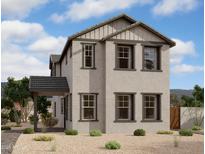 Charming two-story home featuring a neutral color palette, well-maintained landscaping, and a covered entry at 26217 N 19Th Ln, Phoenix, AZ 85085