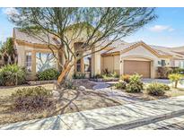 Charming single-story home with desert landscaping, walkway and covered entry at 1313 W Straford Ave, Gilbert, AZ 85233
