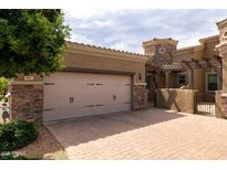 Elegant home featuring a spacious garage and a beautifully paved driveway at 6202 E Mckellips Rd # 171, Mesa, AZ 85215