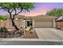 Beautiful single-story home with a two-car garage and desert landscaping at 41229 N Belfair Way, Anthem, AZ 85086