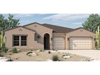 Charming single-story home featuring a two-car garage, desert landscaping, and a welcoming front entrance at 6859 N 190Th Dr, Waddell, AZ 85355