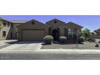 Charming single-story home featuring desert landscaping and a neutral color palette at 1783 W Homestead Dr, Chandler, AZ 85286