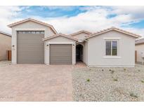 Charming single-story home with a two-car garage and beautiful brick driveway at 18667 E Panchito Dr, Gold Canyon, AZ 85118