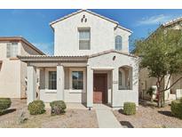 Charming two-story home with a covered porch and low-maintenance landscaping at 5150 W Illini St, Phoenix, AZ 85043