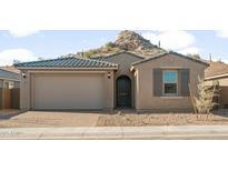 Charming single Gathering home with a two car garage and desert landscaping at 13538 W Calle De Baca --, Peoria, AZ 85383