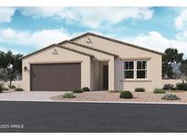 Charming single-story home featuring a two-car garage, neutral stucco, and well-maintained landscaping at 15768 W Beryl Ave, Waddell, AZ 85355