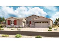 Charming single-story home featuring a two-car garage, stylish stone accents, and desert landscaping at 20624 S 216Th Pl, Queen Creek, AZ 85142