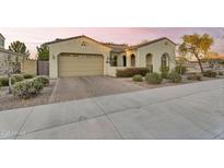 Charming single-story home with desert landscaping, a paver driveway, and a two-car garage at 22126 E Rosa Rd, Queen Creek, AZ 85142