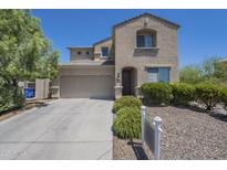 Charming two-story home with a well-maintained front yard and inviting curb appeal at 1236 E Mescal St, Phoenix, AZ 85020