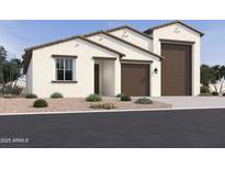 Beautiful single story home with a two car garage and desert landscaping at 15782 W Cheryl Dr, Waddell, AZ 85355