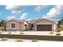 Charming single-story home featuring desert landscaping, a two-car garage, and a decorative stone facade for added curb appeal at 20570 S 216Th Pl, Queen Creek, AZ 85142