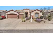 Charming single-story home featuring desert landscaping, a two-car garage, and a covered front entry at 4944 E Dale Ln, Cave Creek, AZ 85331