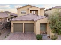 Beautiful two-story home featuring a two-car garage, landscaped front yard, and inviting architecture at 14257 W Harvard St, Goodyear, AZ 85395