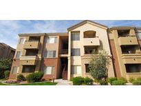 Three-story apartment building featuring balconies and desert-friendly landscaping at 18416 N Cave Creek Rd # 2053, Phoenix, AZ 85032