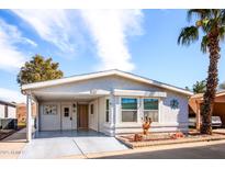 Charming single-story home featuring a carport, desert landscaping, and a well-maintained exterior at 6161 S Oakmont Dr, Chandler, AZ 85249