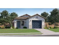 Charming single-story home featuring a tile roof, neutral stucco exterior, and a two-car garage at 36620 W Mondragone Ln, Maricopa, AZ 85138