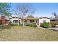 Charming single-story home with manicured lawn and mature landscaping in a peaceful residential neighborhood at 32 E 14Th St, Tempe, AZ 85281