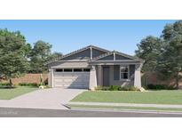 Charming single-story home features a neutral color palette, manicured lawn, and an attached two-car garage at 38233 N Stillmeadow Rd, San Tan Valley, AZ 85140