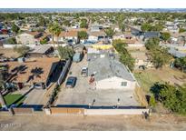 Expansive aerial view of a single-Gathering home showcasing a large lot and proximity to the city skyline at 1312 W Sunland Ave, Phoenix, AZ 85041