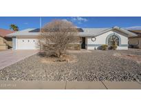 Charming single-story home featuring a two-car garage and low-maintenance desert landscaping at 13914 W Terra Vista Dr, Sun City West, AZ 85375