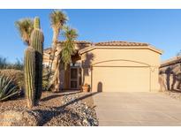 Charming single-story home with desert landscaping, barrel tile roof, and spacious two car garage at 3055 N Red Mtn # 178, Mesa, AZ 85207