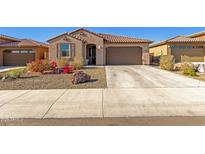Charming single-story home featuring a tiled roof and a well-maintained desert landscape at 12344 E Soloman Rd, Gold Canyon, AZ 85118