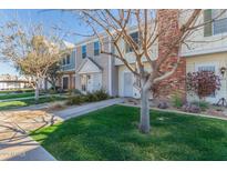 Inviting townhome showcases lush landscaping, mature trees, and a well-manicured lawn at 1601 N Saba St # 264, Chandler, AZ 85225