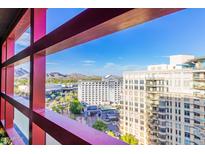 Stunning city and mountain views framed by the condo's unique architecture at 4808 N 24Th St # 1402, Phoenix, AZ 85016