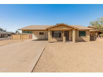 Charming single story home with a covered carport and low maintenance desert landscaping at 8648 N 37Th Ave, Phoenix, AZ 85051