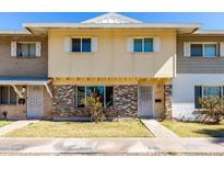 Charming townhome with brick accents, tidy lawn, and well-maintained facade at 4003 S Mill Ave, Tempe, AZ 85282