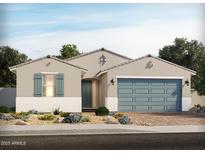 Charming single-story home with blue garage door and shutters and well manicured desert landscaping at 129 N 175Th Ave, Goodyear, AZ 85338