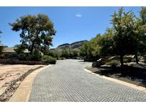 Cobblestone driveway leading to property with mountain views at 5701 E Mockingbird Ln, Paradise Valley, AZ 85253