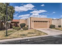 Charming single-story home featuring a 2-car garage, stucco siding and manicured landscaping at 482 Leisure World --, Mesa, AZ 85206