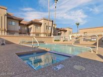 Inviting community pool and spa area with a resort-like ambiance for relaxation and enjoyment at 16528 E Gunsight Dr # 206, Fountain Hills, AZ 85268