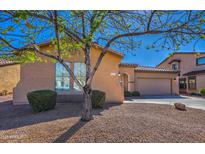 Charming single-Gathering home with a desert landscape, cozy front yard, and a covered entry at 4273 E Gleneagle Dr, Chandler, AZ 85249
