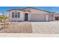 Charming single-story home featuring a two-car garage, neutral stucco, and low-maintenance landscaping at 12361 W Marguerite Ave, Avondale, AZ 85323