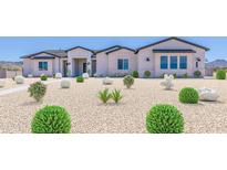 Beautiful single-story home with desert landscaping and modern architectural details at 20277 W Highland Ave, Litchfield Park, AZ 85340