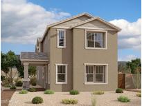 Charming two-story home with neutral tones, white trim, a covered porch, and well-manicured desert landscaping at 2232 W Chisum Trl, Phoenix, AZ 85085