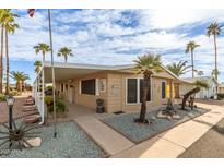 Charming single-story home with a covered porch, desert landscaping and ample parking at 8103 E Southern Ave # 119, Mesa, AZ 85209