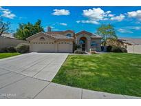 Charming single-Gathering home with well-maintained landscaping, spacious driveway and three car garage at 16018 N 17Th Way, Phoenix, AZ 85022