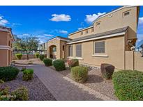 Charming home exterior featuring desert landscaping, pathway, and covered front porch at 3519 E Erie St, Gilbert, AZ 85295